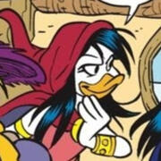 Neraja from the Ducktales Comics. She looks mischievously to the side.